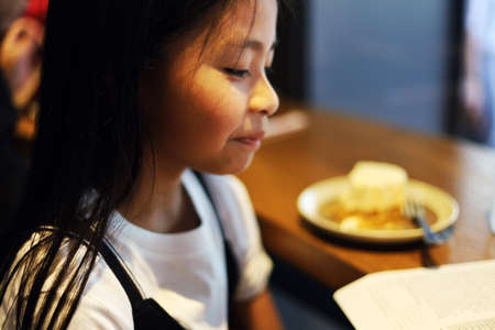 Beautiful happiness Asia child girl smile portrait traveling on holiday weekend.の写真素材