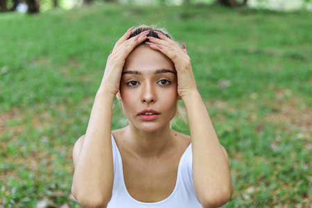 Happiness beautiful woman yoga exercise smile portrait at garden park.の写真素材