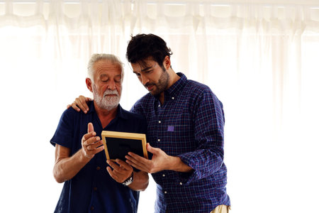 Father and son talking and sharing discussion lifestyle for domestic life at home.の写真素材