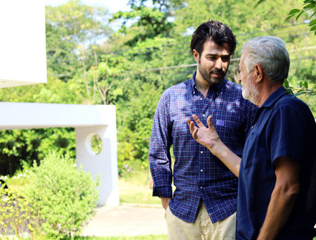 Father and son talking and sharing discussion lifestyle for domestic life at home.の写真素材
