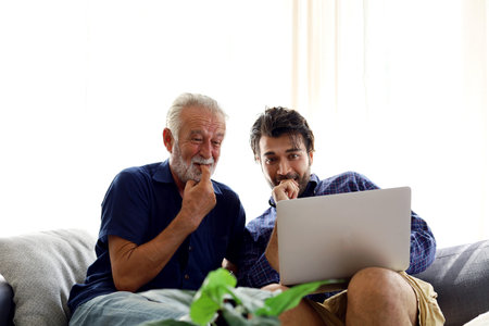 Father and son talking and sharing discussion lifestyle for domestic life at home.