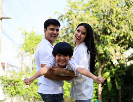 Happiness young family and resting at home in holiday weekend.の写真素材