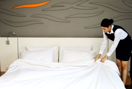 Employees woman are cleaning hotel rooms during the holidays.の写真素材
