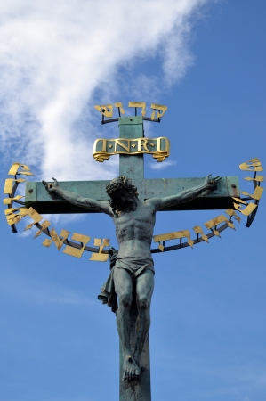Cross and blue sky with cloudsの写真素材