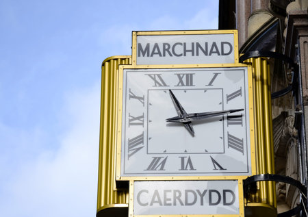 Detail of Cardiff market clock and sky