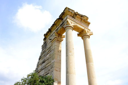 Architecture from the sanctuary of Apollon Hylates and cloudy blue sky