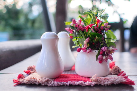salt and pepper shaker on the dining tableの写真素材