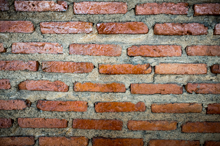 Red brick and concrete texture abstract pattern backgroundの写真素材