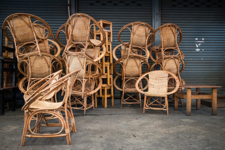 Brown rattan chairs classic style on dark blue wallの写真素材
