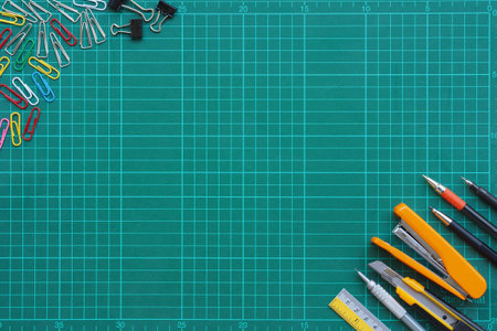 Stationery on a cutting matの写真素材