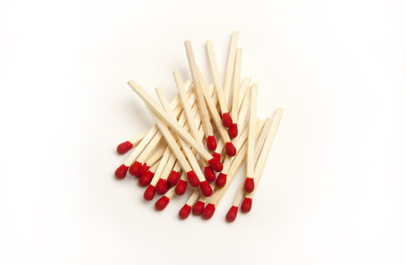 red matches isolated on a white backgroundの写真素材