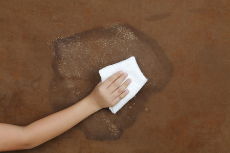 clean up stain on wallの写真素材