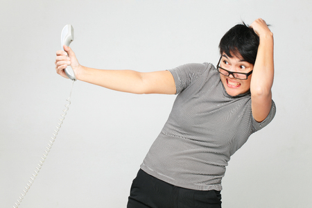 unhappy woman on the phoneの写真素材