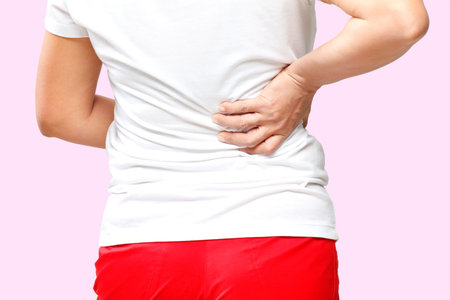Woman With Pain In Her Back