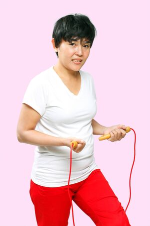 woman with a  jumping ropeの写真素材