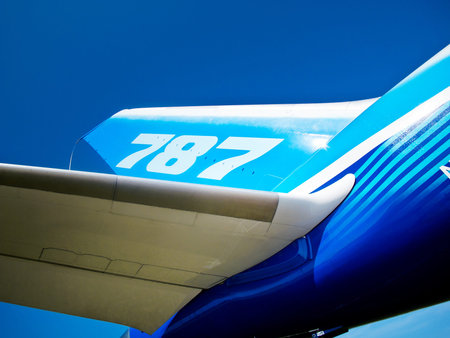 Tail and wing of 787 Boeing Dreamliner at International Aviation & Space Salon in Moscow MAKS,...