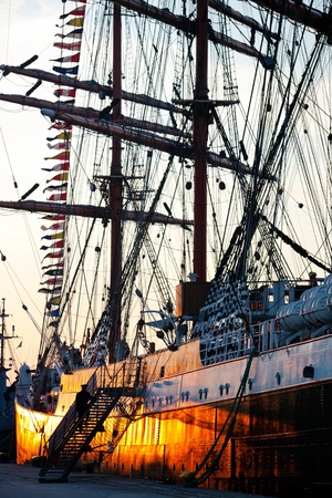 Tall ship,barque Sedov on sunset, in port at Culture 2011 Tall Ships Regatta,20 large vessels,dozen of smaller boats,1000 participants.September 05,2011 in Gdynia, Polandのeditorial素材