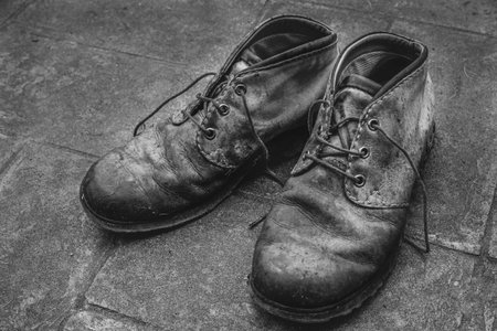 Old shoes and used in the fields tell their history just looking at them