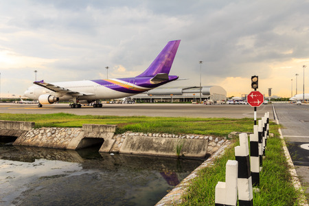 Airplane is driving on taxiway のeditorial素材