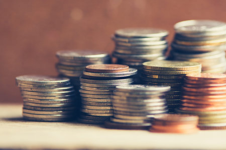 Stack of coins stock financial indices on currency exchange. Financial stock market in accounting...