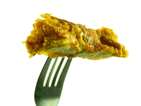Fried chicken with fork, White .の素材
