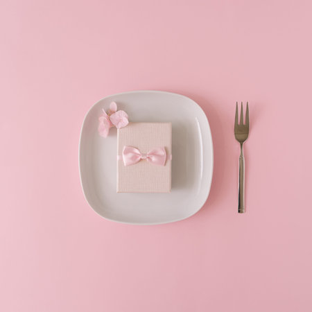 Romantic composition made of gift box served on plate with pink details.Romantic concept.Flat lay.