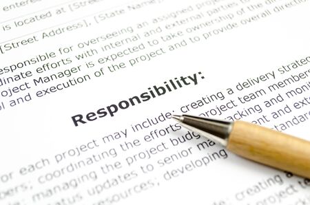 responsibility with wooden penの写真素材