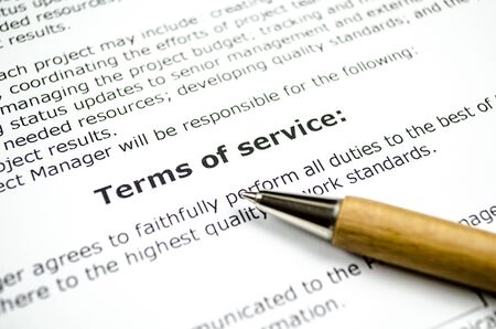 Terms of service with wooden penの写真素材