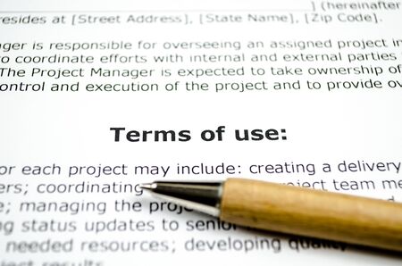 Terms of use with wooden penの写真素材