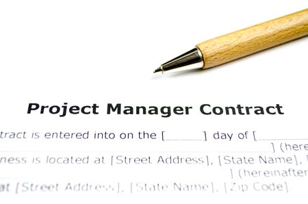 Project manager contract with wooden penの写真素材