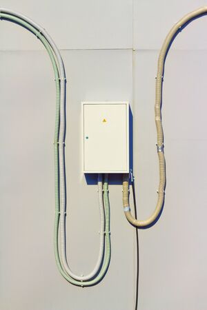 switch box with multiple incoming and outgoing cablesの写真素材