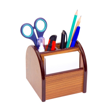 Office wooden stand for pens and pencils on a white backgroundの写真素材
