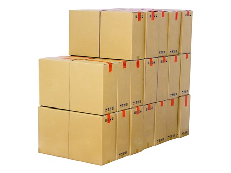 stack of cardboard boxes isolated on white backgroundの写真素材