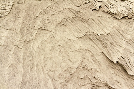 patterns of erosion of sand in the backgroundの写真素材