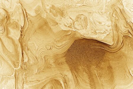 patterns of erosion of sand in the backgroundの写真素材