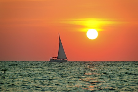image boat trip at sunsetの写真素材