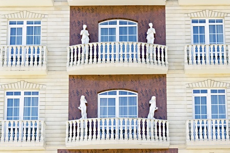 female sculptures on the facade of the buildingの写真素材