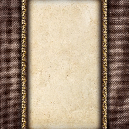 Vintage card in a carved frame on fabric backgroundの写真素材