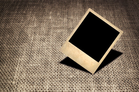 Old-style photo on the background of linenの写真素材