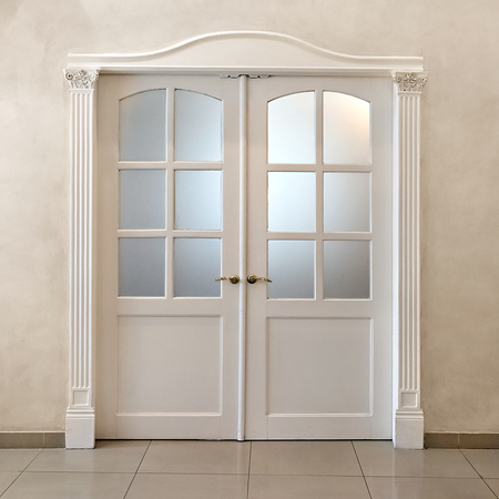 White double-leafed door of classical designの写真素材