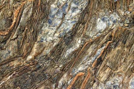 stone rock with cracks in the background