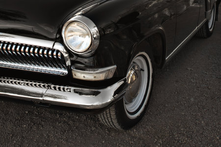 Front headlight and radiator grille of an old retro carの写真素材
