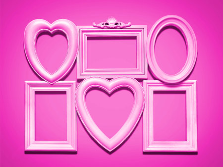 Decorative photo frames on a pink backgroundの写真素材