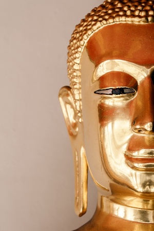 half Face Golden buddhaの写真素材
