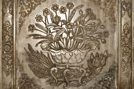Carvings on the walls inside the wat phar kaew carved by Thai artisans given to learning のeditorial素材
