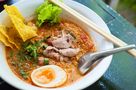 Pork noodle tom yum, condensed water egg.の写真素材