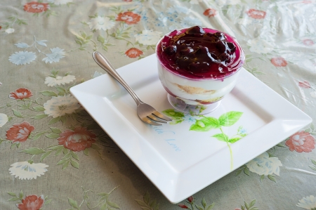 Fancy blueberry cake in white dish  の写真素材