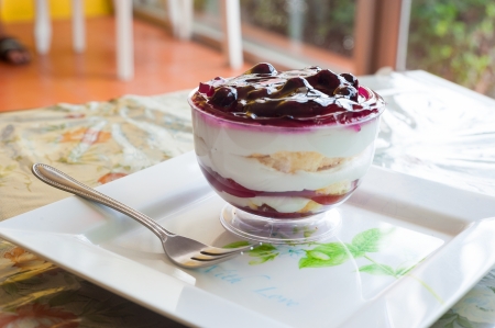 Fancy blueberry cake in white dish  の写真素材