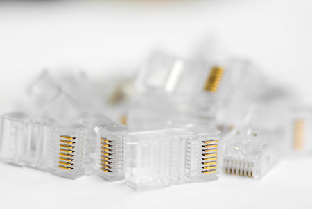 Network Cable RJ45 Head on white background .