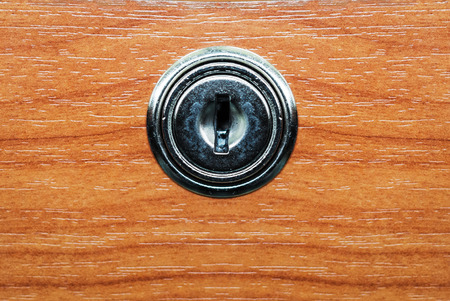 Keyhole in wood texture- Stock Imageの写真素材